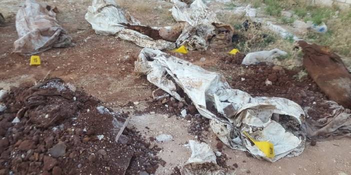 Afrin’de toplu mezar ortaya çıktı! Tüyler ürpertici manzara!