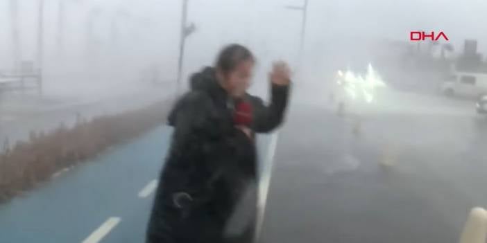 Canlı yayında fırtınaya yakalandı