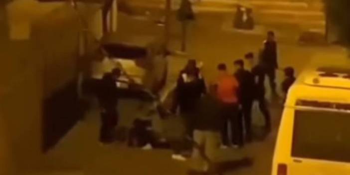 Kucağındaki çocukla tekmeli yumruklu saldırıya uğradı