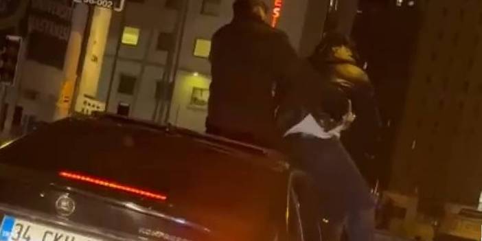 Otomobil üstünde tehlikeli yolculuk