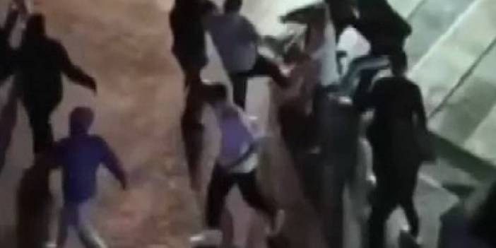 Eşine şiddet uyguladı, çevredekiler tekme tokat dövdü