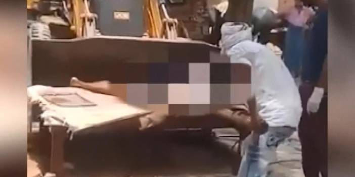 Hindistan'da dehşet veren görüntüler! Cesetler dozerlerle taşınıyor